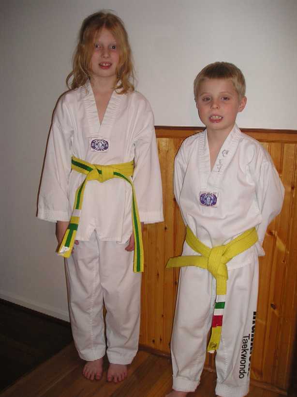 05  3 28  Brianna & Anthony de Gaston in Taekwondo suits red40pct  P3282606